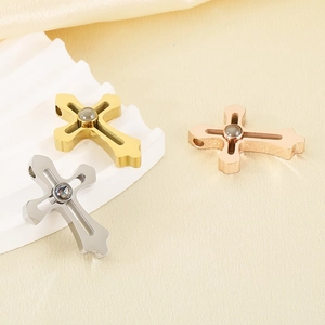 Projection cross necklaces in gold, silver, and rose gold with central hidden love gem