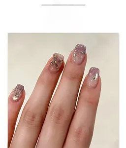 Detail of JL0688 purple gradient press-on nails with 3D butterfly and rhinestone accents