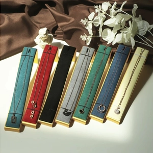 Professional velvet necklace display stands with gold trim in various colors for jewelry