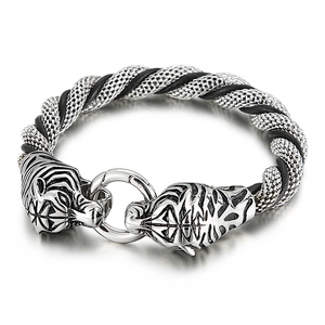 Punk style stainless steel tiger head bracelet with black woven details on white background