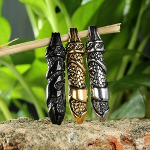 Three men's stainless steel dagger pendants in black, gold, and silver on tree branches