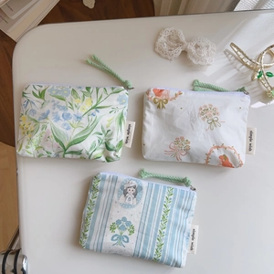 Floral cotton mini storage bags with zipper and brand label for makeup and small items