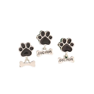 Detail of silver alloy dog paw charms featuring bone pendants engraved with DOG MOM