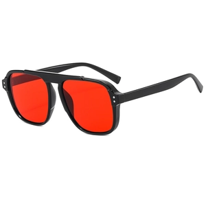 Fashion oversized sunglasses with thick black frame and bold red lenses in 45-degree angle
