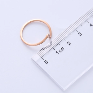 Macro shot of rose gold wave ring measuring 1.7cm inner diameter with micro-inlaid zircons