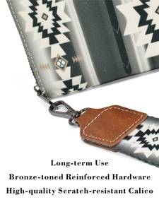 Detail of bohemian canvas clutch with bronze hardware and scratch-resistant calico fabric