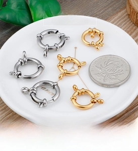 Macro detail of high quality titanium steel spring ring clasps with three link rings