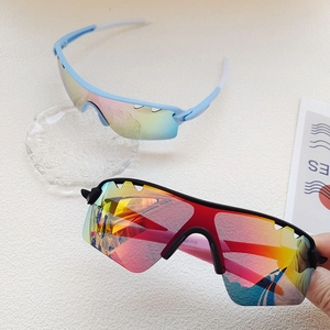 Detail view of stylish kids cycling sunglasses with polarized lenses and anti-slip temples