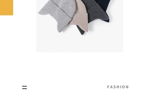 Close-up of ribbed knit texture on stylish beanies in gray, beige, and navy blue