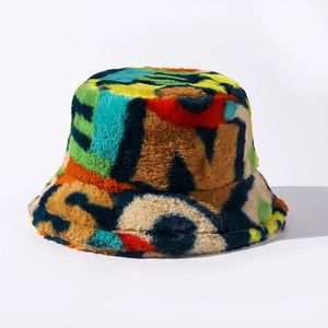 Colorful faux fur bucket hat with artistic graffiti pattern and warm plush texture