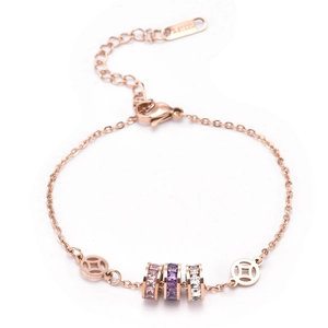 Bracelet en acier inoxydable or rose avec cristaux tricolores et pièces évidées