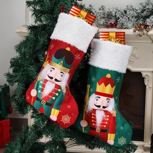 Christmas stocking with nutcracker soldier print and faux fur trim on a holiday tree