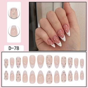 White French almond press-on nails with silver rhinestones and glossy pink base