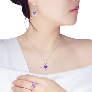 Sparkling amethyst jewelry set with purple gemstone ring, necklace and stud earrings