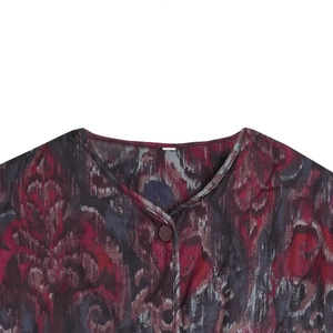 Quilted boho style jacket with geometric print and single button closure for women