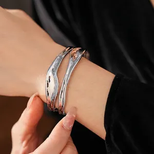 Minimalist silver irregular double-layer ripple open bangle with liquid metal texture finish