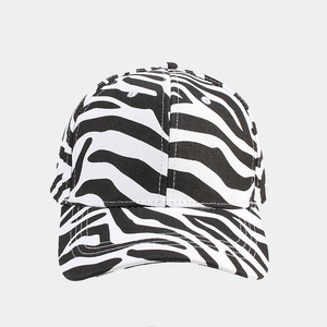 Close-up of zebra pattern baseball cap featuring high-quality twill cotton and fine stitching