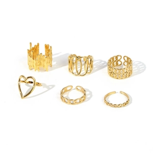 Set of six gold stainless steel rings featuring heart, chain, and textured wave designs