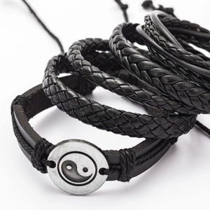 Adjustable multilayer braided black leather bracelet set featuring Yin Yang metal charm