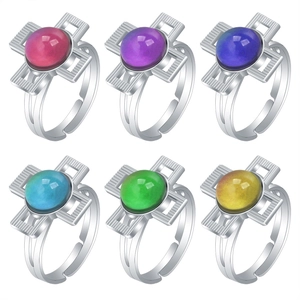 Macro view of adjustable retro rings with colorful mood gemstones in various colors