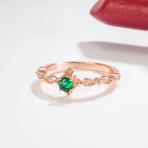 Elegant rose gold plated ring featuring a round emerald green gem and S925 engraving