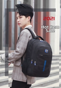 Detail view of large capacity waterproof black business sports backpack with side mesh pocket