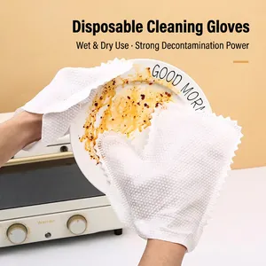 Disposable non-woven cleaning glove wiping grease from a plate, dry and wet dual use