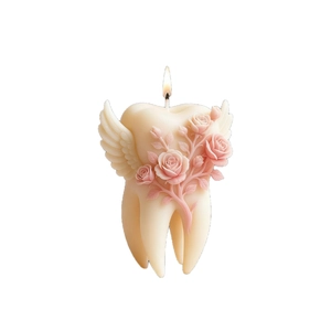 Angel tooth scented candle with pink roses and white wings on a clean white background