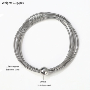 Detail view of 9.9g stainless steel spring bracelet with 10mm bead and sizing specs