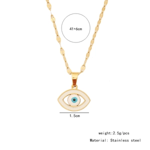 Close-up of golden stainless steel necklace featuring a blue evil eye enamel pendant