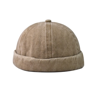 Detail of vintage washed brown miki hat featuring 6-panel stitching and rolled edge brim