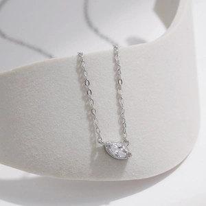 Minimalist S925 sterling silver necklace featuring a marquise cut clear gemstone pendant