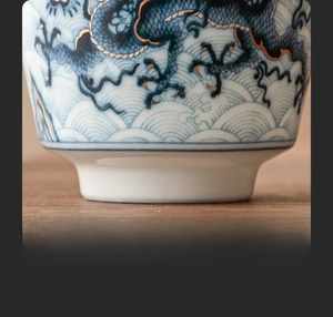 Detail of the polished ceramic base on a blue and white dragon porcelain tea cup