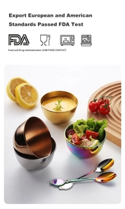 Colorful stainless steel dipping bowls with long handled spoons on a wooden tray