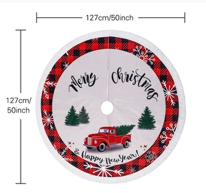 Detail of 50-inch Christmas tree skirt with red truck print and white tassel edges