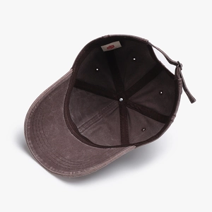 Distressed brown washed cotton baseball cap with adjustable metal buckle and vintage design