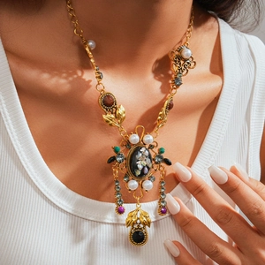 Detailed close-up of retro court style necklace with colorful resin gems and pearls
