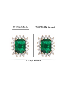 Detail view of emerald-cut green earrings with white zircon halo and dimensions info