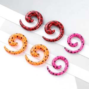 Trois paires d'écarteurs spirale en rouge orange et rose avec motifs d'étoiles et de crânes