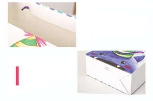 Close-up of thickened cardboard gift bag with shark print and reinforced handles
