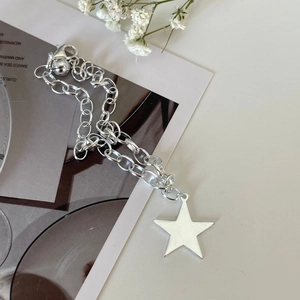 Minimalist S925 sterling silver chain bracelet with a polished star pendant and lobster clasp
