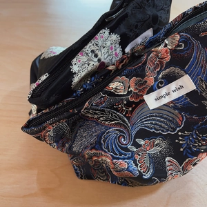 Oriental phoenix brocade cosmetic bag in black jacquard fabric with Simple Wish label