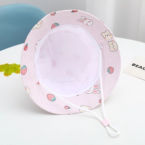Pink kids bucket hat detail with breathable mesh lining, size 52 tag and windproof cord