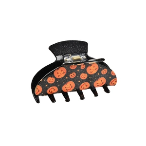 Halloween pumpkin ghost hair claw clip with black glitter finish and orange Jack-O-Lanterns