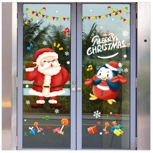 Detailed view of Merry Christmas window stickers featuring Santa, penguin, and snowflakes
