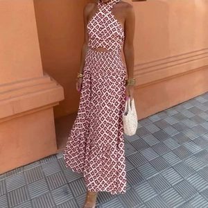 Red and white geometric print halter neck maxi dress with waist cut-out elegant design
