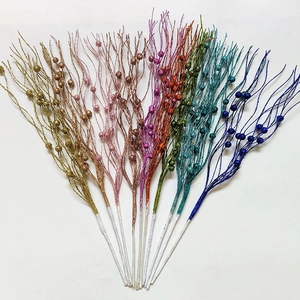 Sparkly Christmas glitter berry picks in assorted colors for festive tree decoration