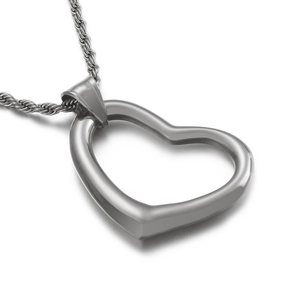 Minimalist stainless steel heart pendant necklace with twisted chain on white background