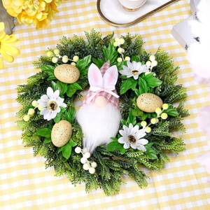 Easter gnome wreath with white beard, pink bunny ears, speckled eggs and daisies on checkered base