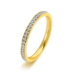 Polished gold stainless steel eternity ring with cubic zirconia at a 45-degree angle